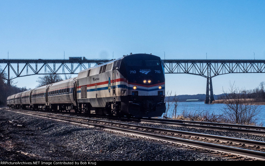 AMTK 710 leads Empire Service train north along the Hudson River